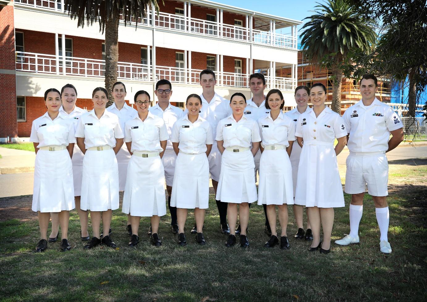 A group of people wearing white uniforms

Description automatically generated with medium confidence